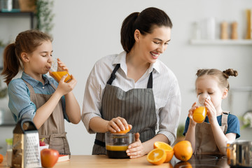 Happy family in the kitchen.