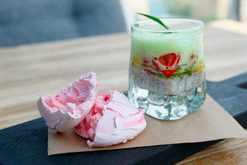 Dessert with chia seeds, and mango, focus on meringue