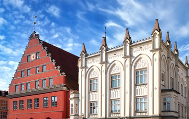Market square with town hall an historic buildings in the city of Greifswald