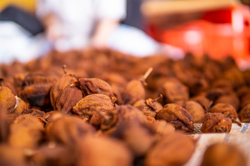Japanese Dried Persimmon (Hoshigaki) hanged on strings to dry a common sight in Da Lat, Vietnam and placed in an airtight house. Good for health.