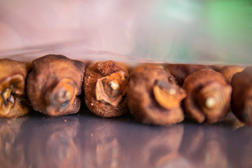 Japanese Dried Persimmon (Hoshigaki) hanged on strings to dry a common sight in Da Lat, Vietnam and placed in an airtight house. Good for health.