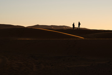 A sunset on the sahara desert