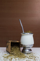Traditional South American Yerba Mate tea and dry yerba mate, on wood background 2