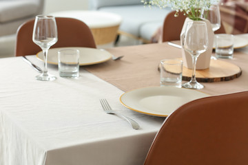 Served table in modern dining room