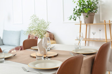 Served table in modern dining room