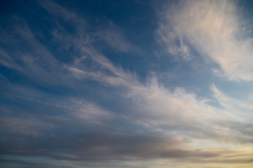 Naklejka na ściany i meble Sunset sky with clouds. Nature background.