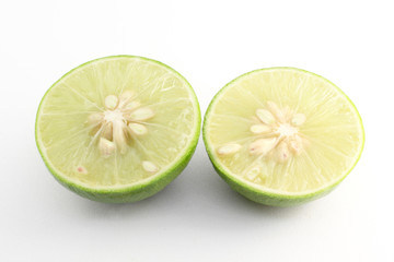 Juicy slice of lime isolated on  white background