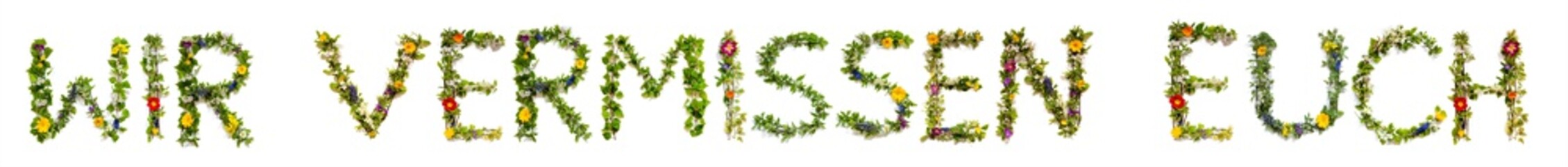 Flower, Branches And Blossom Letter Building German Word Wir Vermissen Euch Means We Miss You. White Isolated Background