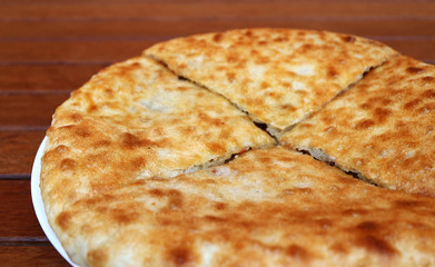 Closeup Kubdari, the North-western Georgian Traditional Flat Bread Stuffed with Spiced Beef or Pork