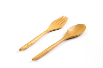 Wooden spoon and fork on white.