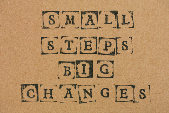 Cardboard with words Small Steps Big Changes