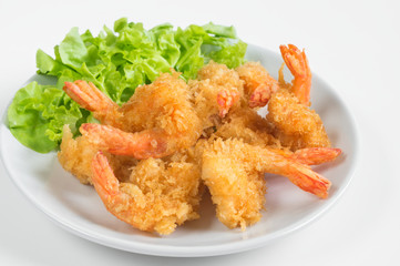Deep fried shrimps on ceramic plate,white background.