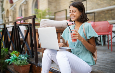 Beautiful young happy cheerful woman enjoying her time and freedom