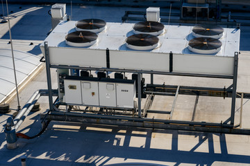 Fans of the air conditioning unit on the roof.