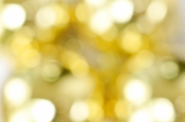 Fototapeta premium blurry golden shiny light background and texture