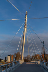 Urban pedestrian bridge in Finnish spring sunshine