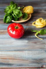 Vegetables. Tomato and Basil. Italian food,  still-life.