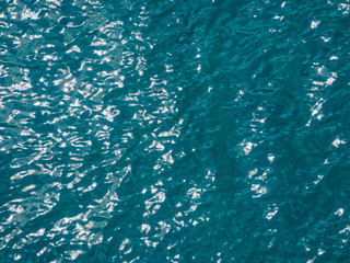 Abstract texture blue sea with sunny reflections, Thassos, Greece