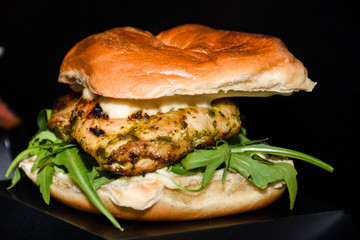 Fresh melting burger ready to eat during fast food festival.