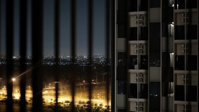 Time lapse view night of highway from condominium terrace in Bangkok until dawn,Thailand