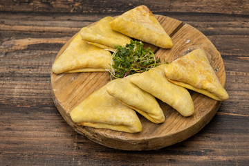 Frozen pancakes on a wooden background