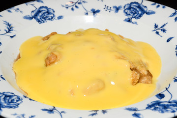 Traditional English apple pie with vanilla pudding on top