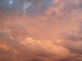 Naklejka na ściany i meble Beautiful clouds at sunset. Background with a beautiful sky.