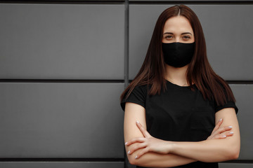 Beautiful Girl Wearing Medical Mask During Coronavirus COVID-19 Epidemic Pandemic Covid-19...