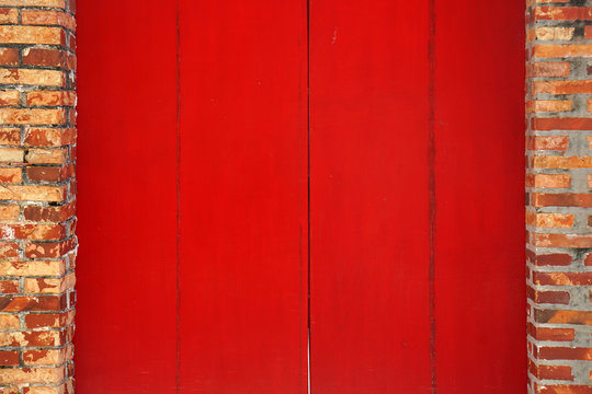 Closeup Red Wooden door texture background - abstract surface with copy space                                