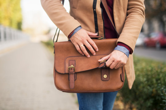 Close Up Of A Man Holding A Briefcase.