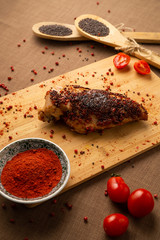 Sliced chicken breast in spices