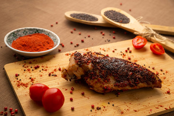 Sliced chicken breast in spices