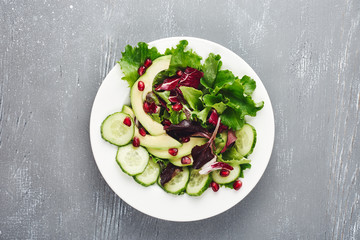 Lettuce salad with cucumber, avocado.