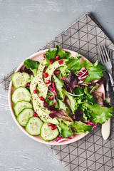 Lettuce salad with cucumber, avocado.