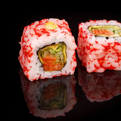 Sushi on black background. Perfect for creating sushi restaurant menu.