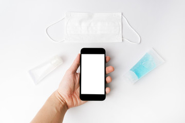 Mockup image of black mobile phone with blank white screen.