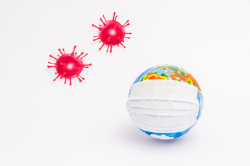 globe in protective medical mask near red drawn virus on white