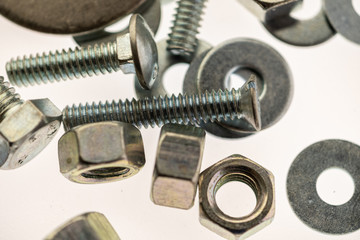 sheet metal and stainless steel screws together with hex nuts