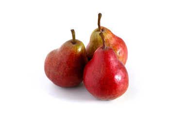 Three red pears on a white background. Fruit