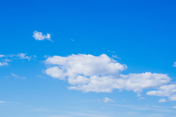 Clean blue limitless sky with clouds