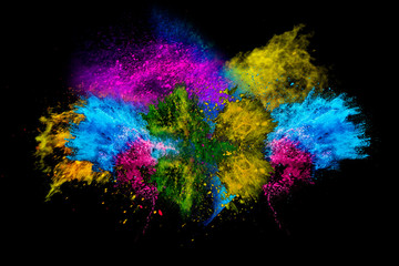 Fototapeta na wymiar Colorful powder explosion on black background. Colorful dust explode. Paint Holi.