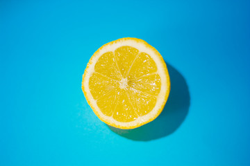 Ripe Lemon on blue background