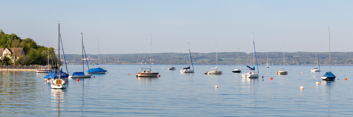 Panorama with sailboats anchoring at Ammersee (Lake Ammer)