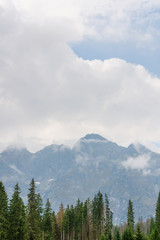 Obraz premium Tatra mountains covered with clouds and thick fog.