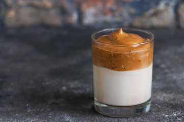 Dalgona coffee - trendy Korean drink with whipped instant coffee.