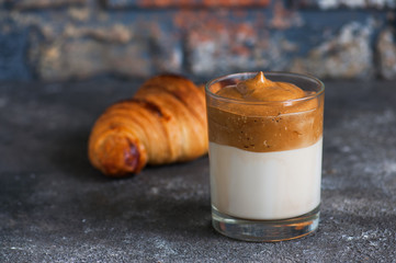 Dalgona coffee - trendy Korean drink with whipped instant coffee.