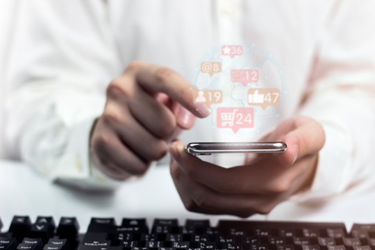 Young Business use their fingers to enter laptop, choose menus, conceptual social media and digital marketing. Data Information Networking Concept,with copy space.