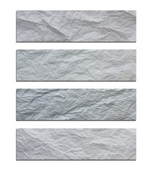 white and gray wide crumpled paper texture background. crush paper so that it becomes creased and wrinkled.
