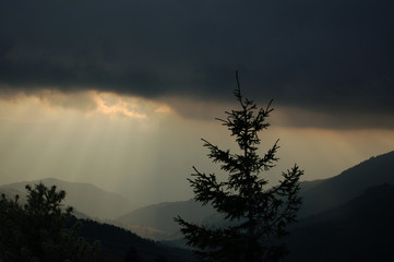 Clouds and sunlight in the morning mountains