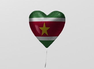 Suriname flag in heart balloon